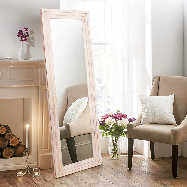 large rustic wooden mirror at studio apartment