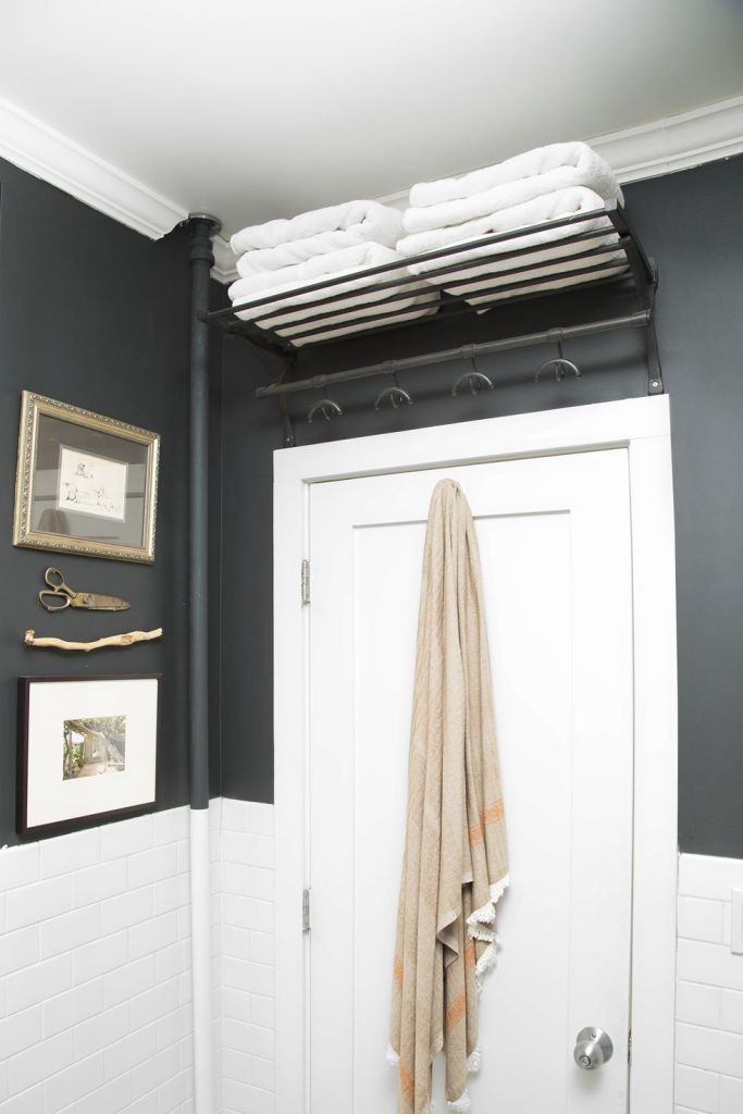 hanging shelf above bathroom door
