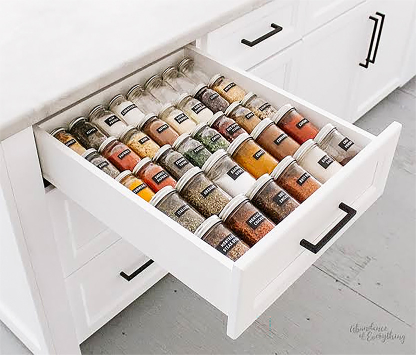 Organized Spices inside cabinet drawer